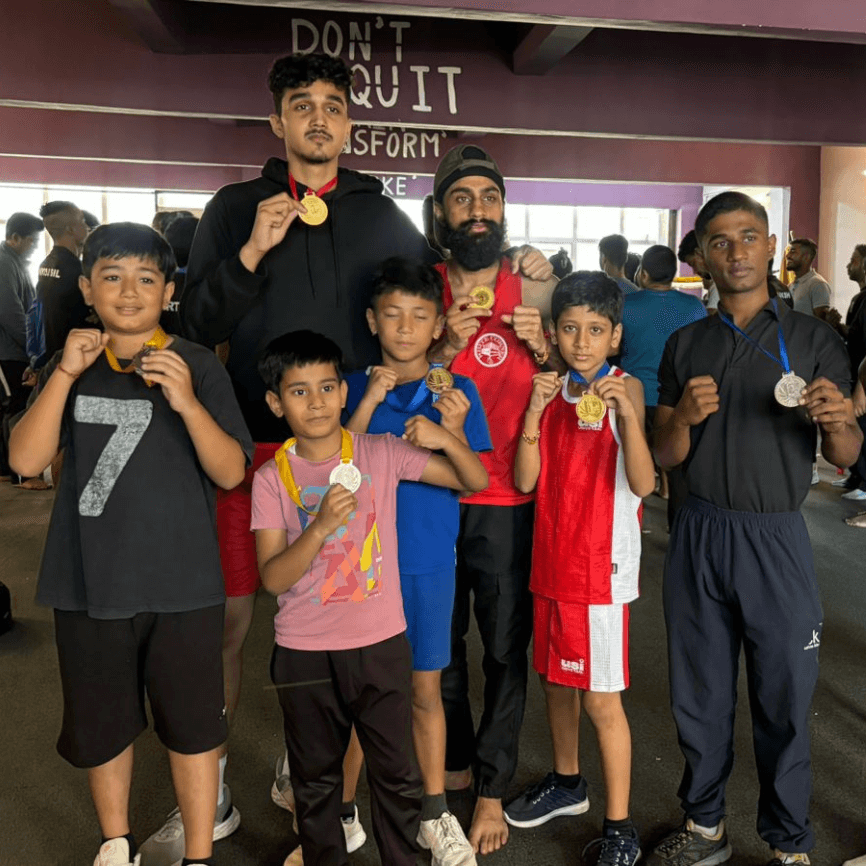 Kids and Youngsters boxing group photo at White Corner Boxing Academy in Bangalore after self-defense and fitness boxing class.