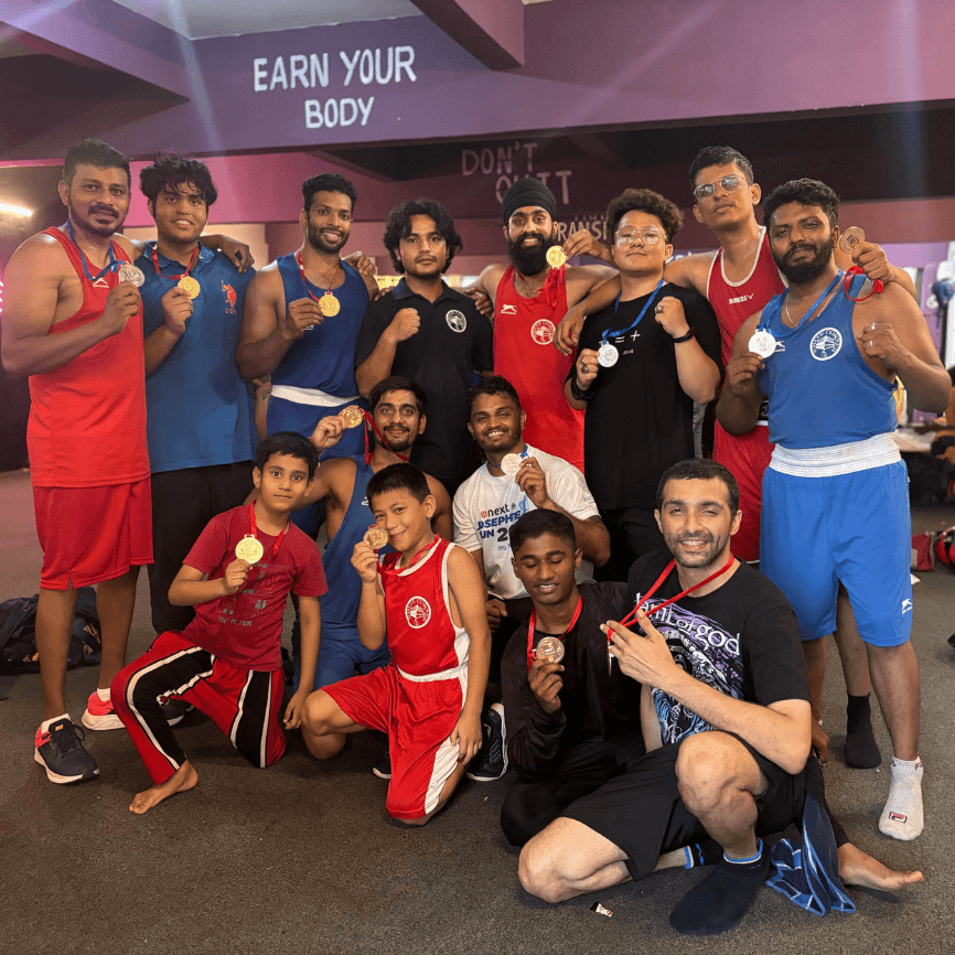 Boxing students celebrating after fitness challenge and sparring event at White Corner Boxing Academy in Koramangala, Bangalore.