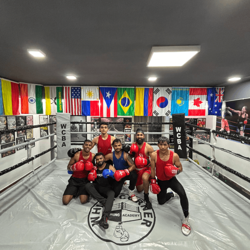 Group of boxers posing after sparring session at White Corner Boxing Academy, top boxing gym in Bangalore for training and fitness.