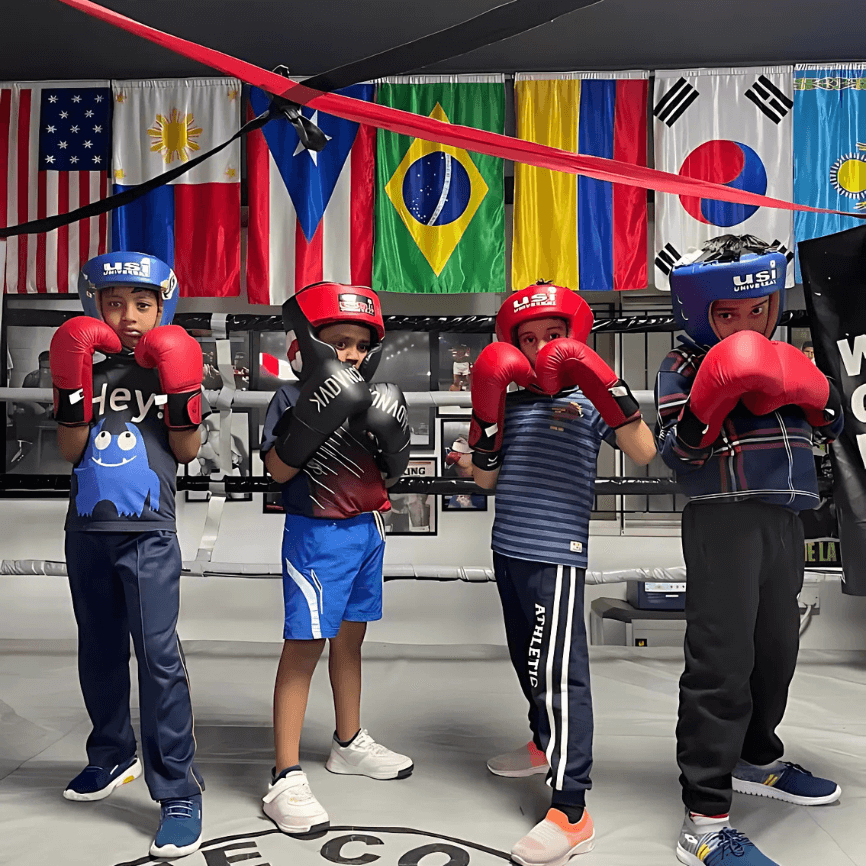 Kids preparing for sparring during beginner boxing sessions in Bangalore at White Corner Boxing Academy.