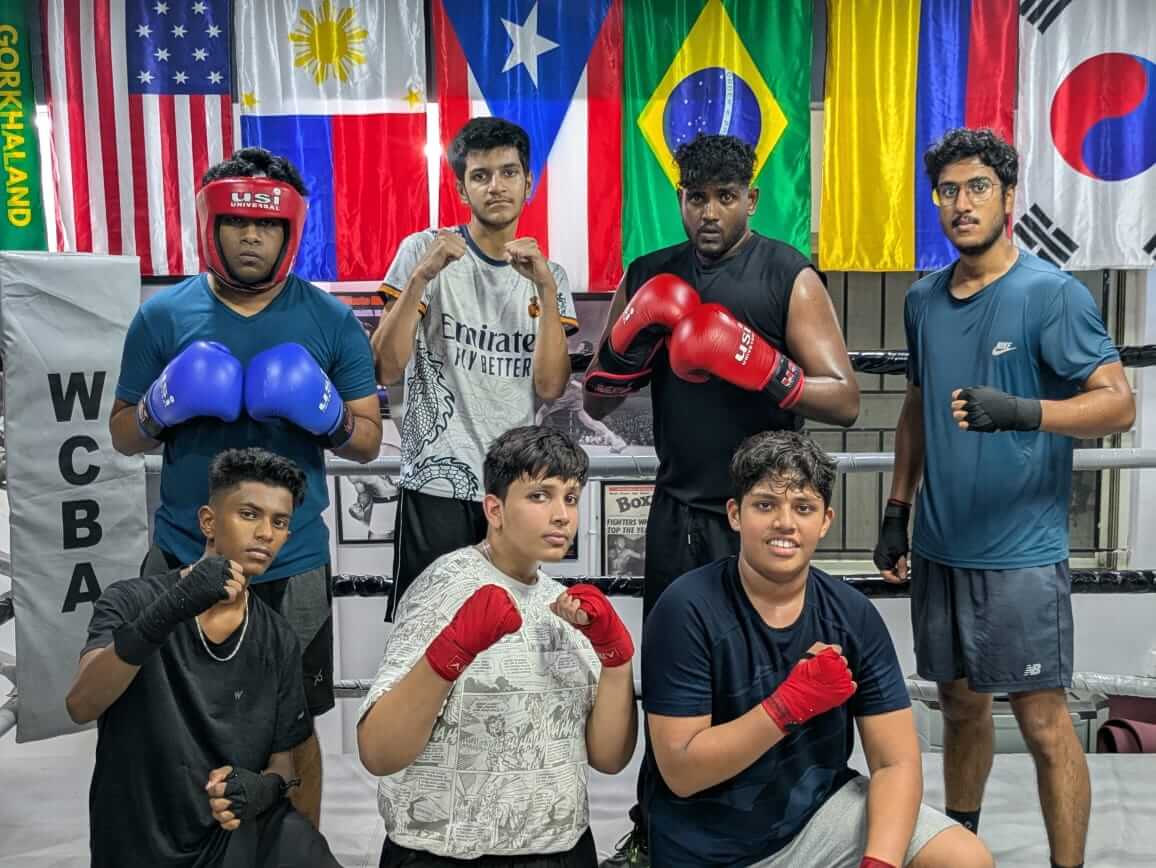 Group of young boxing students after a beginner boxing class at White Corner Boxing Academy in Bangalore, focusing on fitness, form, and safety.