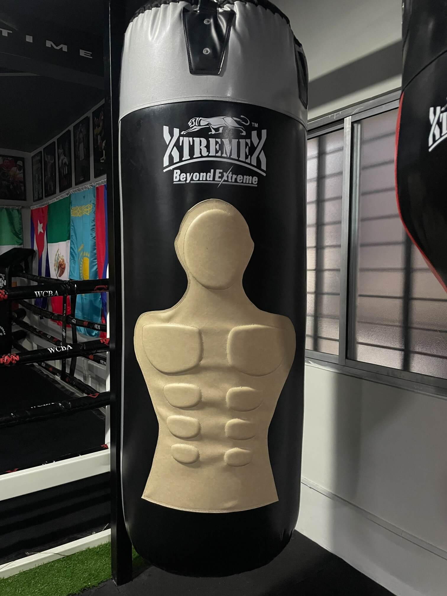 Target training dummy bag at White Corner Boxing Academy used for boxing strength training and striking accuracy in Bangalore