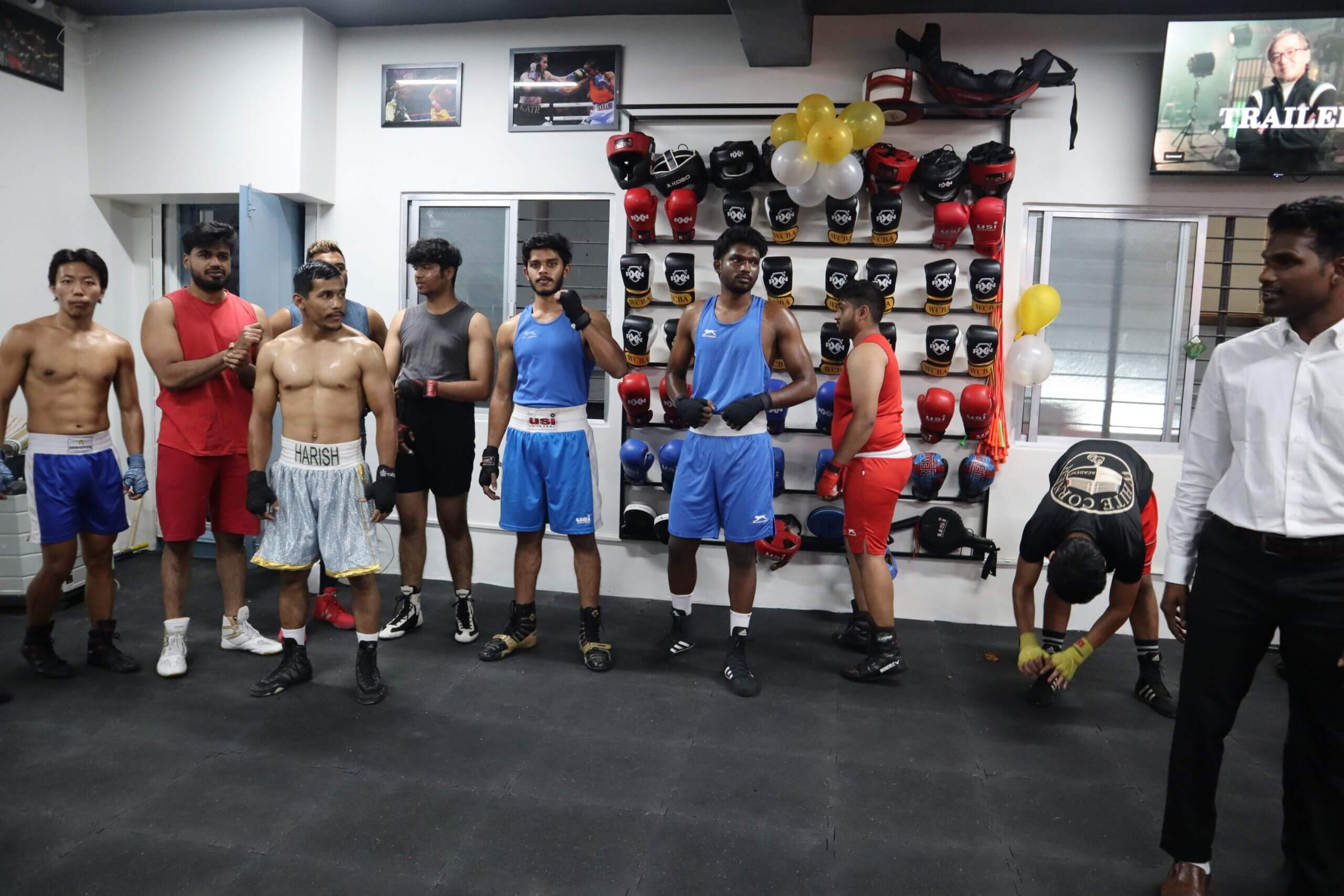 Boxers preparing for sparring session at White Corner Boxing Academy, focused on fitness and safety for beginners in Bangalore